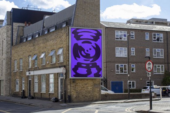 Urban mockup of a large purple billboard with abstract design on a building exterior, ideal for presentations and advertising designs.