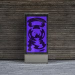 Outdoor advertising mockup showcasing digital poster display with purple abstract design against a wooden wall used by designers.