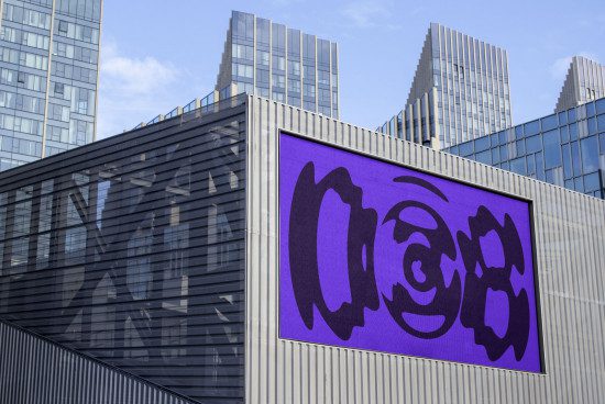 Urban billboard mockup on modern building facade with dynamic abstract purple graphic design for advertising and branding presentation.