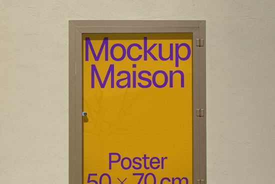 Poster mockup displayed in a glass case on a textured wall, for graphic designers to showcase work, size 50x70cm, easily editable.
