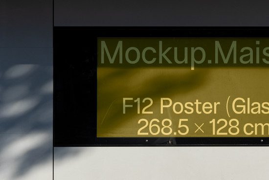 Poster mockup design displayed on outdoor billboard with shadows, suitable for presenting advertising and branding graphics.