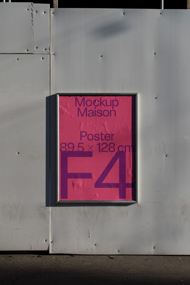 Urban billboard mockup for outdoor advertising displayed in natural light, featuring a large pink poster with minimalist design. Ideal for graphic presentation.