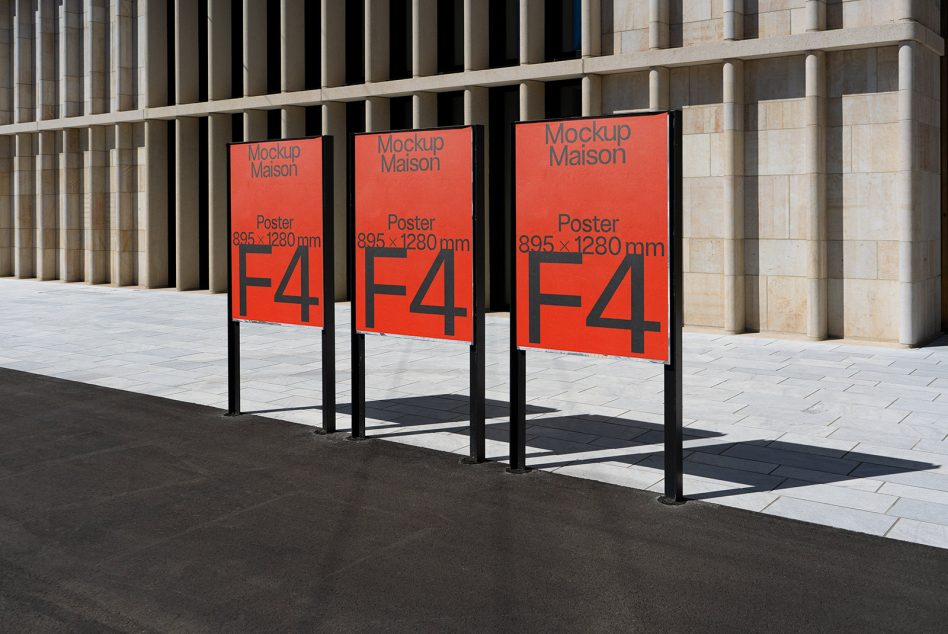 Three red poster mockups in series on tiled floor with pillars behind