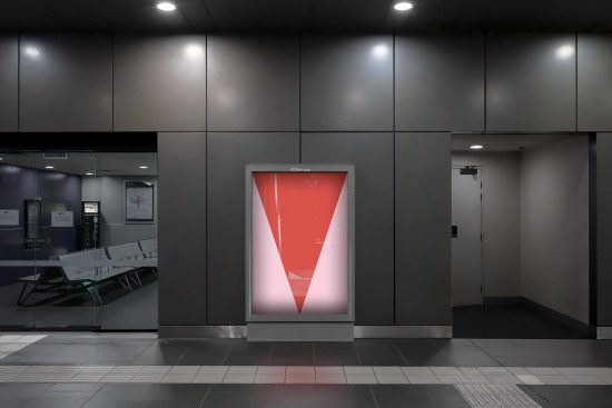 Modern digital kiosk mockup in a corporate environment with advertising display for designers and marketers.