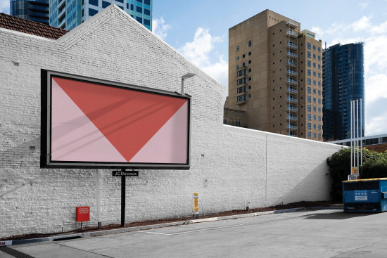 Urban billboard mockup on white brick wall with blank red poster for advertising design, city background, clear sky, designers asset.