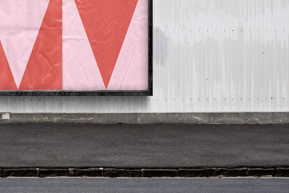 Urban poster mockup on corrugated metal wall with geometric design, showcasing juxtaposition of textures for graphic display.