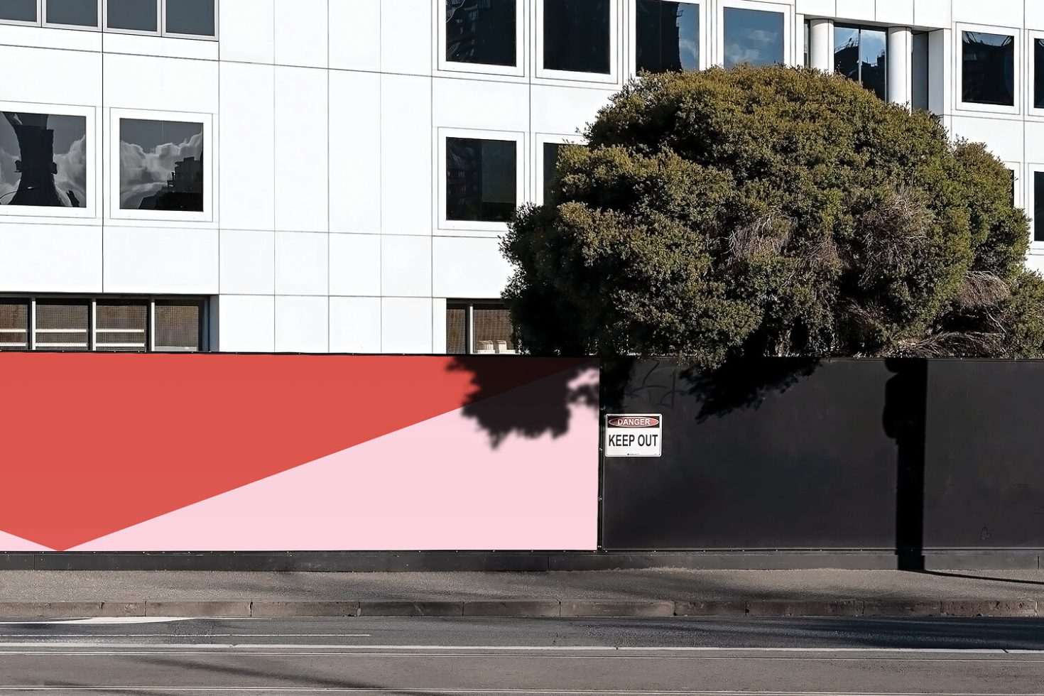 Urban street with diagonal billboard design mockup, tree shadow overlay, and 'Danger Keep Out' sign, for graphic display template.