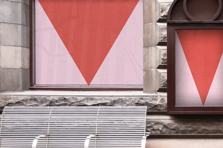 Urban poster mockup on a window behind a metal grille, showcasing graphic design display in a realistic city environment for advertising.