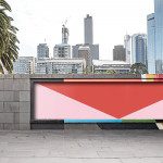 Urban billboard mockup for advertising in a city environment with buildings in the background, suitable for graphic designers.