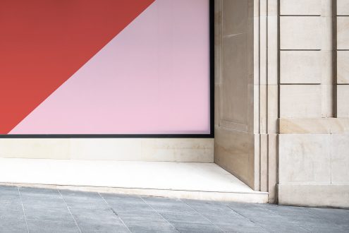 Outdoor billboard mockup in urban setting with clear sky for advertising and poster design display, designers' marketing material template.