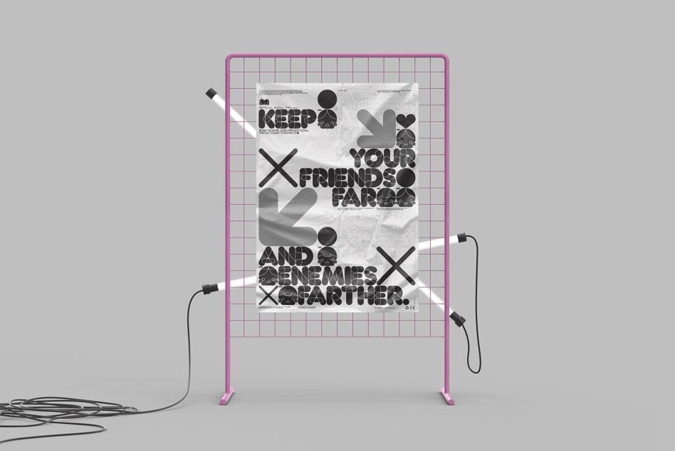 Bright magenta frame stand displaying typographic poster with grunge overlays