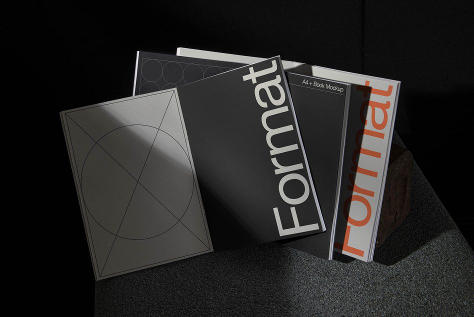 Three book mockups arranged on dark surface with geometric line designs on covers