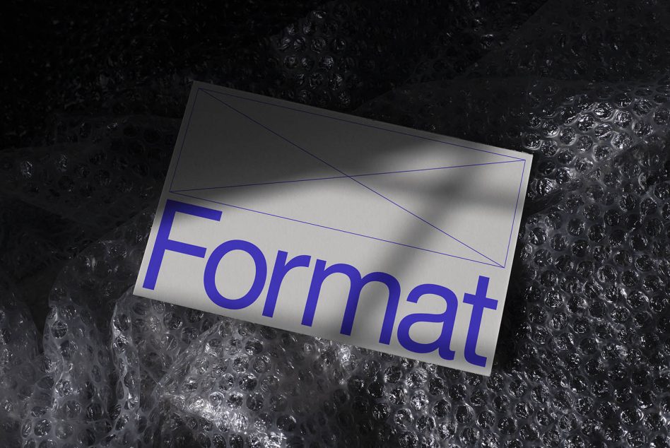 Bright blue text on white card on black textured background