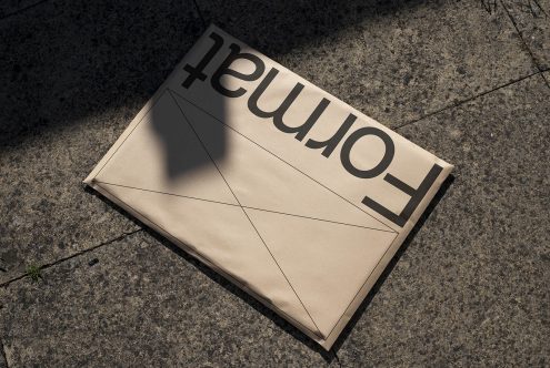 Folded poster mockup with shadow overlay on concrete, showcasing modern typography design for print templates. Ideal for graphic presentations.