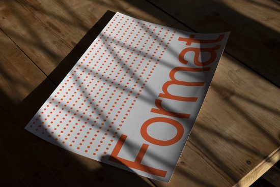 Realistic paper mockup on wooden surface with shadows, featuring typographic design - perfect for presentations and portfolio display.