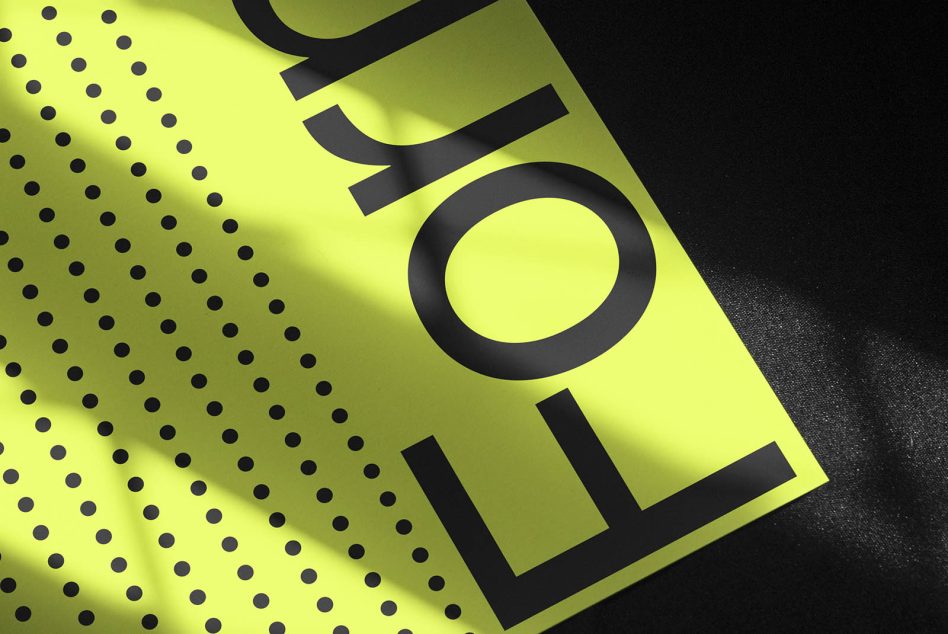 Yellow poster mockup with black dots and typography showcasing modern design, graphic print, creative presentation for designers and advertising.