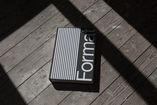 Elegant book cover mockup on wooden floor with natural shadows, showcasing modern typography and minimal design, ideal for presentation.