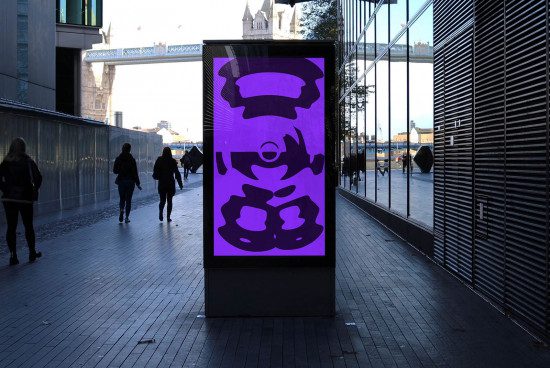 Outdoor digital billboard mockup with purple chef graphic in urban setting, perfect for designers to showcase advertising designs.