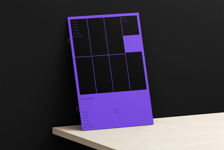 Purple poster mockup leaning on black wall on wooden desk, minimalist design, clean lines, graphic display, modern presentation, designer asset.