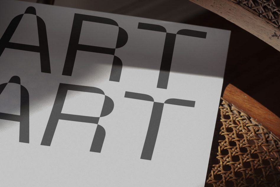 Double Art Directed text on white card with dimensional shadow on woven fabric