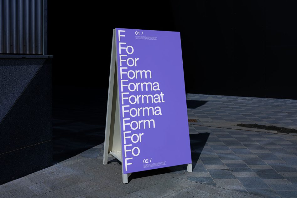 Purple A-frame sidewalk display showing repeating word pattern in white sans serif font