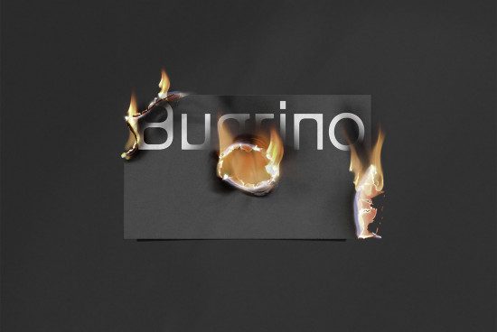 Creative paper burn effect mockup with dynamic flames and editable text for showcasing typography or logo designs on a dark background.