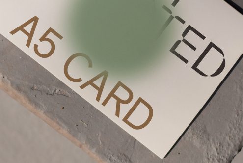 A5 size card mockup with editable design, elegant font, on textured surface, perfect for presentation, graphic design asset.