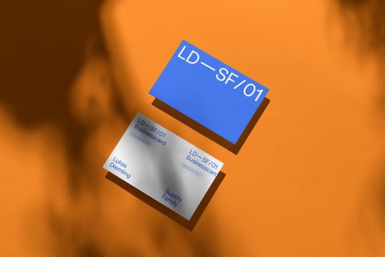 Modern business card mockup with shadow overlay on orange background, showcasing front and back design for graphic designers.
