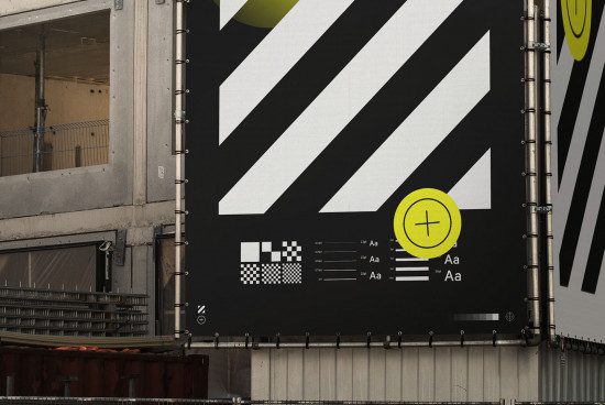 Urban billboard mockup showcasing a black and white design with graphic elements and different font sizes, ideal for presentation, advertising.