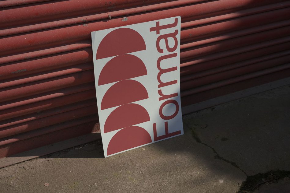 Print poster mockup leaning against red metal shutter, showcasing modern font design, ideal for graphic designers.