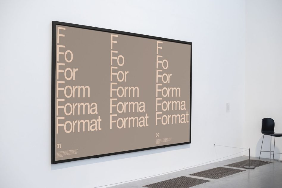 Framed tan poster on gallery wall showing stacked Forma Format text columns