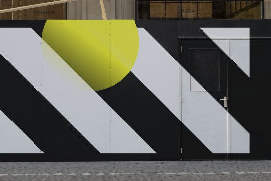 Modern geometric wall art with bold black and white patterns and a pop of yellow, perfect for urban mockup designs and graphics.