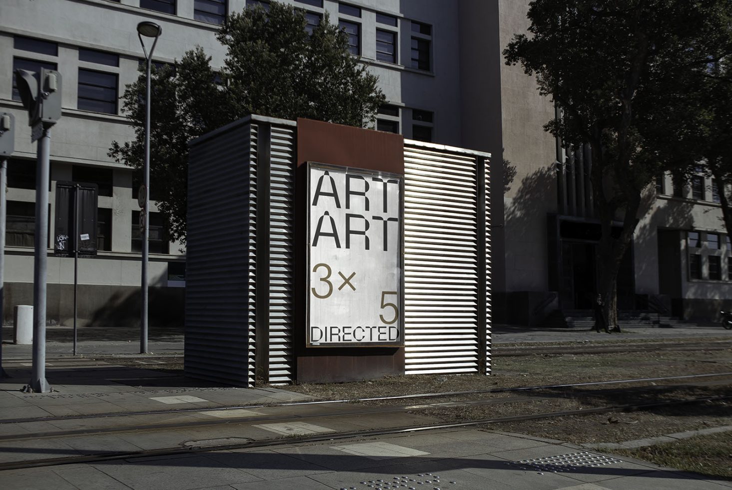 Urban street art kiosk mockup featuring bold typography with the words ART repeated and 3x5 directed, suitable for poster or advertising design.