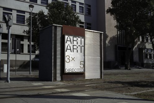 Urban street art kiosk mockup featuring bold typography with the words ART repeated and 3x5 directed, suitable for poster or advertising design.