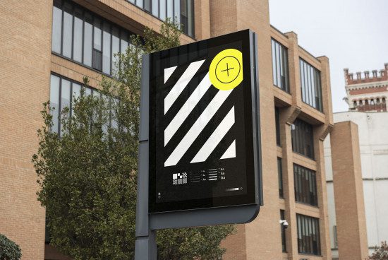 Outdoor billboard mockup with a black design and yellow icon, displayed in an urban environment, perfect for designers, urban advertising graphics.