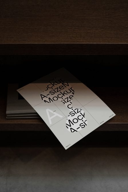 Printed poster mockup on wooden shelf with typographic design, ideal for presenting font or graphic designs in a realistic interior setting.