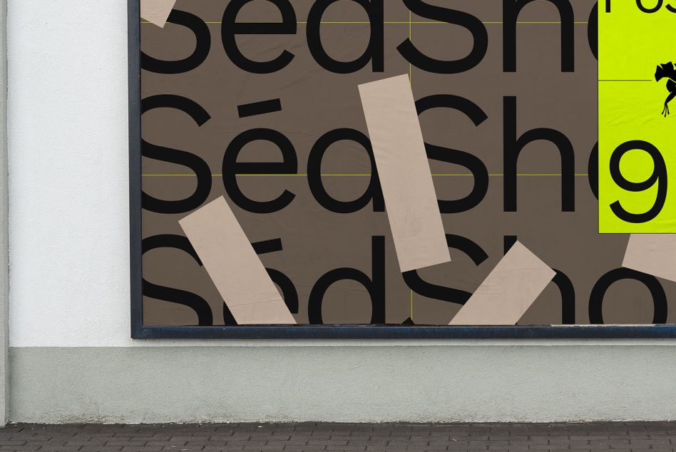 Window display showing close-up of typography poster with tape details