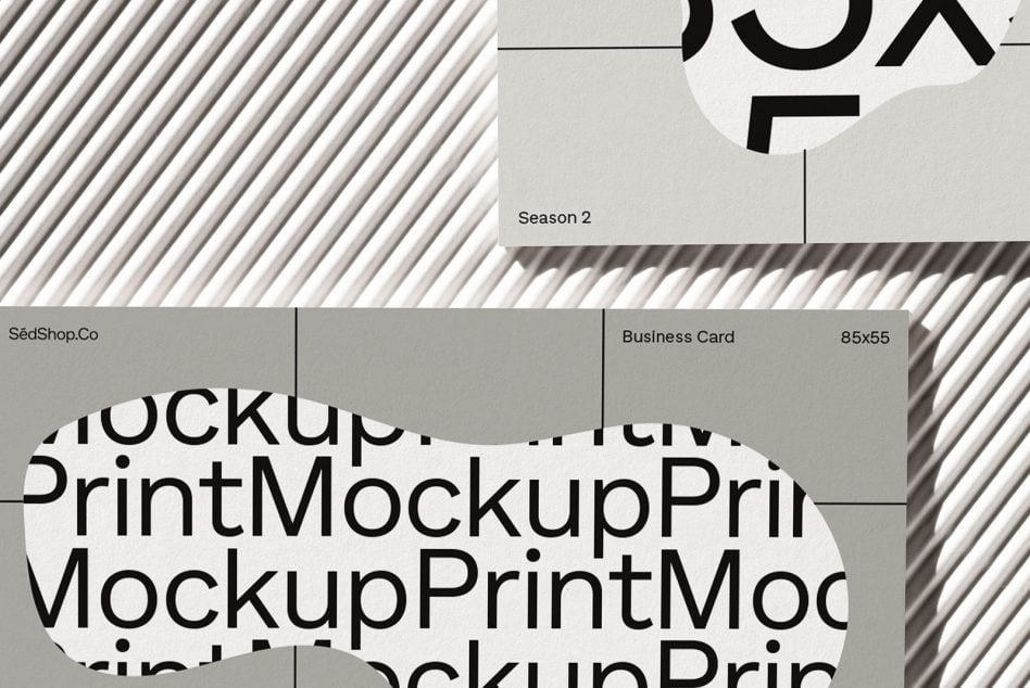 Minimal business card mockup on diagonal striped surface with typography cutouts