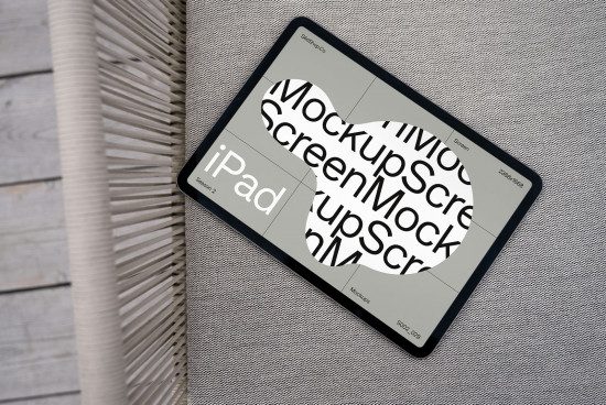 iPad digital mockup on textured surface displaying screen design, ideal for presentations and portfolio showcases, high-resolution template.