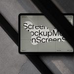 Modern tablet screen mockup on marble surface with shadow overlay for showcasing design projects, digital assets, user interface designs.
