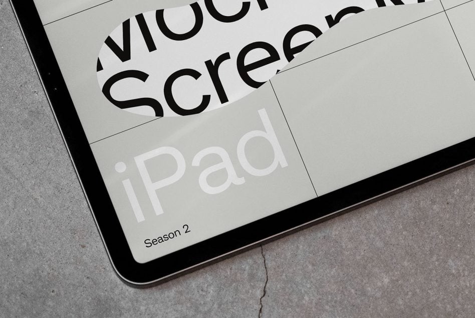 Closeup of iPad screen displaying bold sans serif typography mockup