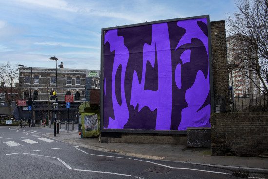 Urban billboard mockup with abstract purple design on city street background, perfect for posters, ads showcasing in a realistic setting for designers.