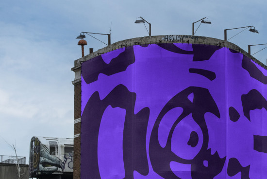 Urban street art mockup on a curved building wall with a vibrant purple camo pattern, appealing for designers creating edgy graphics.