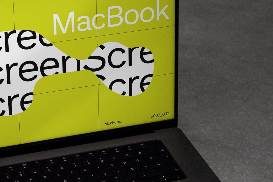 MacBook screen mockup displaying bright yellow design with cutout shapes for screen mockup presentation