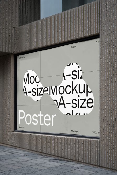 Outdoor storefront display with large A-size poster mockups in window against corrugated metal backdrop