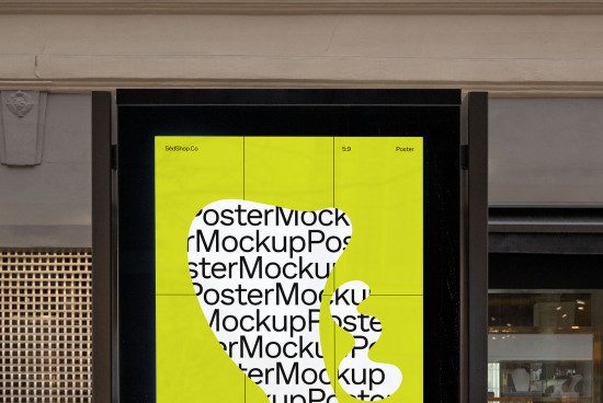 Outdoor poster mockup displayed in a black frame, realistic urban setting, vibrant yellow for graphic design projects.