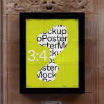 Bright yellow poster mockup in a black frame on a textured wall, showcasing font and layout design, perfect for graphic designers.