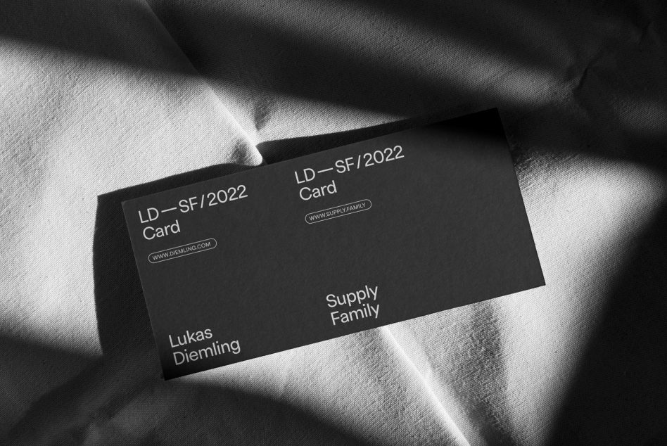 Elegant black business card mockup with clean design, shadow overlay, and textured background, ideal for designers and branding presentations.