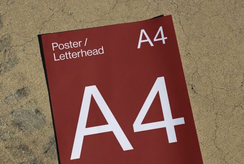 A4 poster mockup on textured background, ideal for presenting letterhead and graphic designs, with clear space for branding.