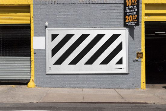 Street-level billboard mockup with contrasting diagonal stripes on urban building wall, ideal for bold designs, outdoor advertising visuals.